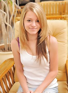Small framed teen Marianna gets naked and spreads her cooch