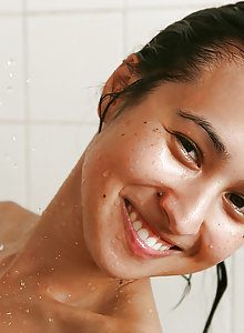 Sexy young brunette amateur Toni B loving her own body in the shower